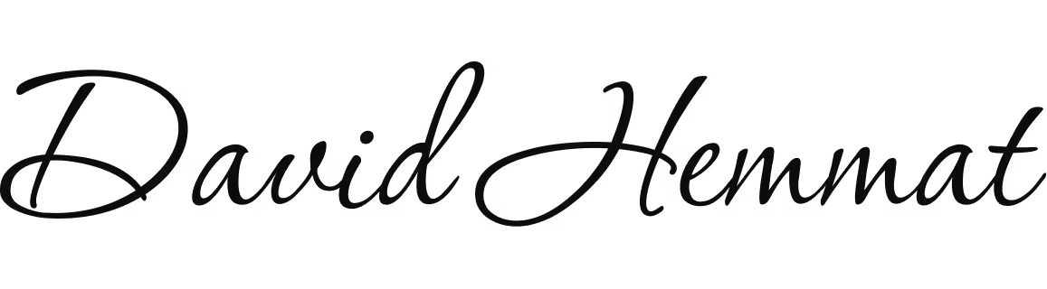 Abstract black signature with flowing and sharp lines on a white background.