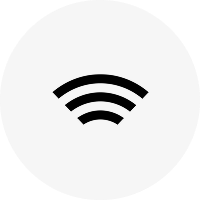 Black Wi-Fi signal icon on a light gray circular background.