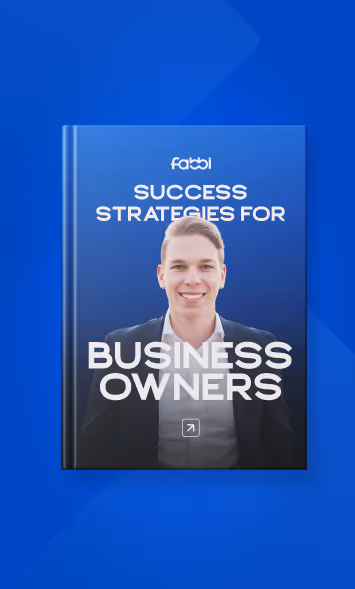 Book cover titled 'Success Strategies for Business Owners' featuring a smiling young man in a suit on a blue background.