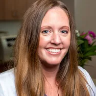 A headshot of Dr. Jennie Austin smiling.