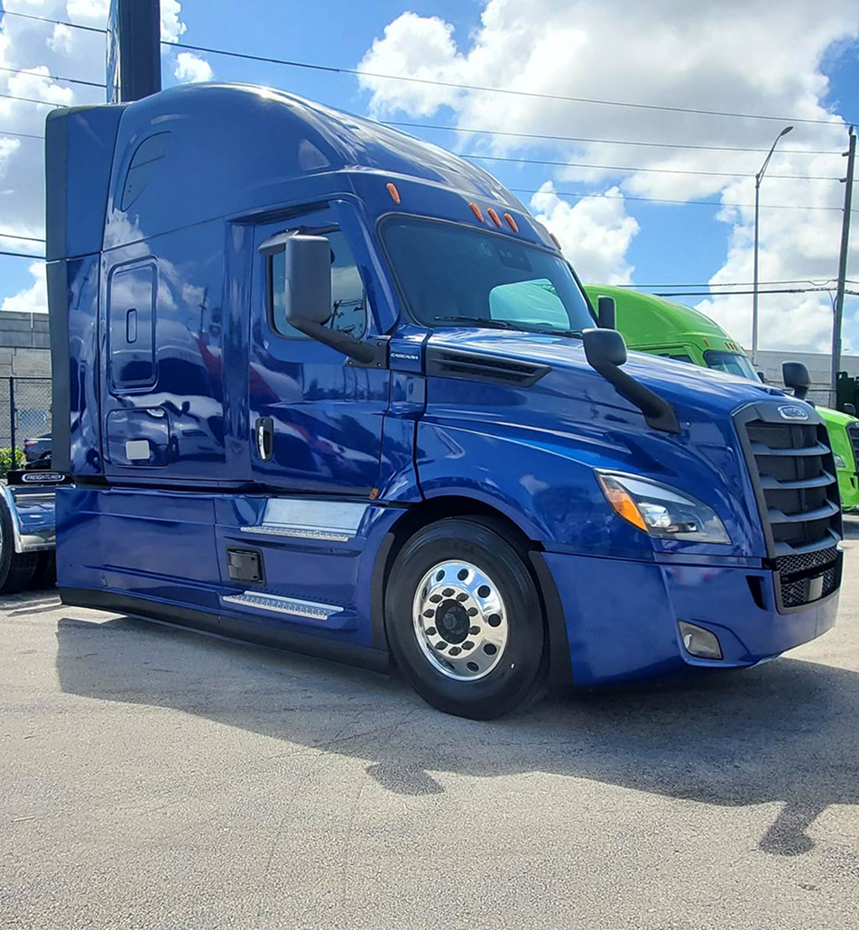 Blue semi-truck highlighting power-only freight solutions with flexible and reliable service
