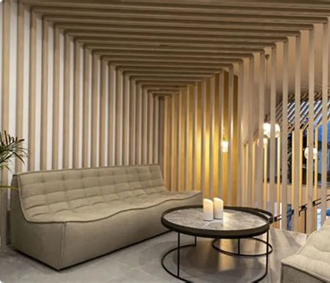 Agencement intérieur en claustra bois avec espace salon