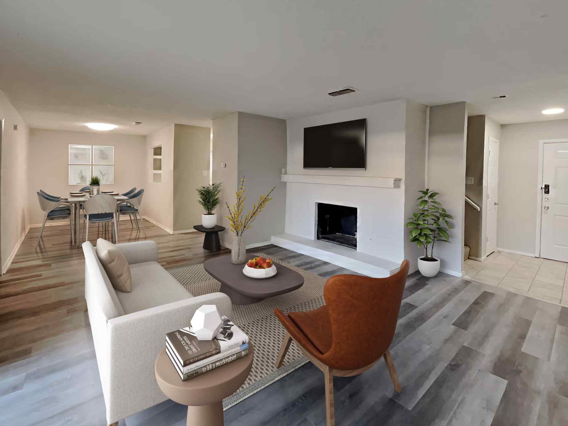 Staged living room at Del Estrado Townhomes, featuring stylish furniture in Lubbock, TX.