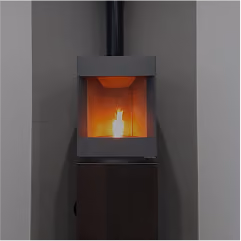 Modern black wood stove with a visible flame inside against a gray tiled wall.
