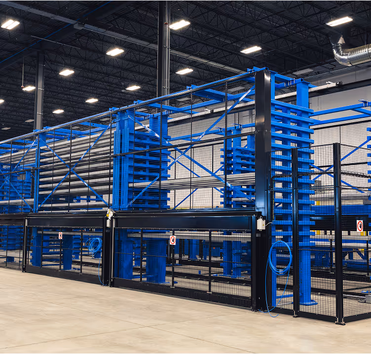 Blue industrial storage rack system in a large warehouse with bright lighting
