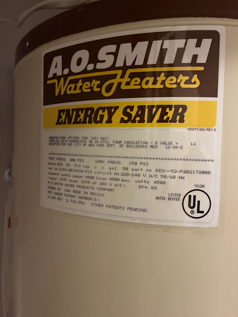 Label on an A.O. Smith Energy Saver water heater detailing specifications and compliance information.