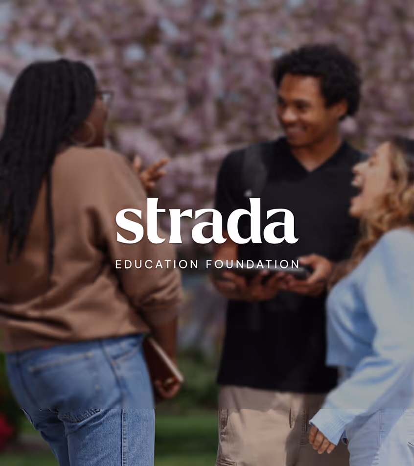 Three diverse young adults standing outdoors, smiling and conversing with a blurred background of trees.