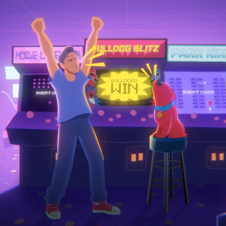 Animated scene of a person and a red dog celebrating a win in front of an arcade machine displaying 'BULLDOGS WIN'.