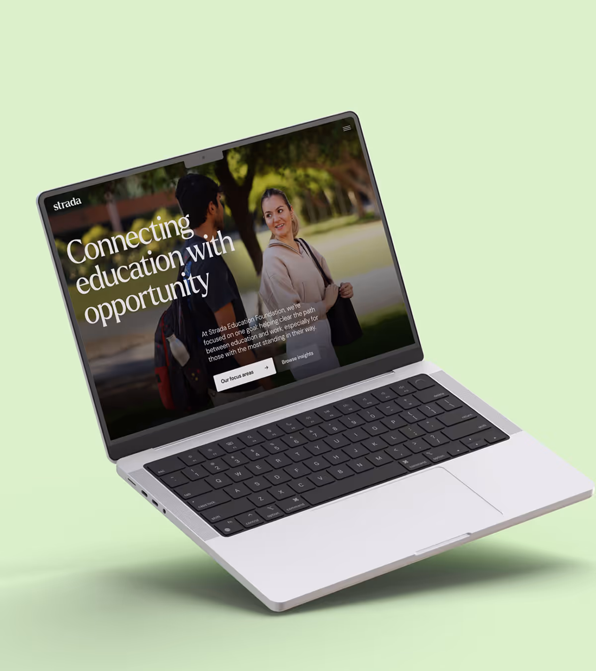 Laptop displaying a website with two people talking outdoors and text about connecting education with opportunity.