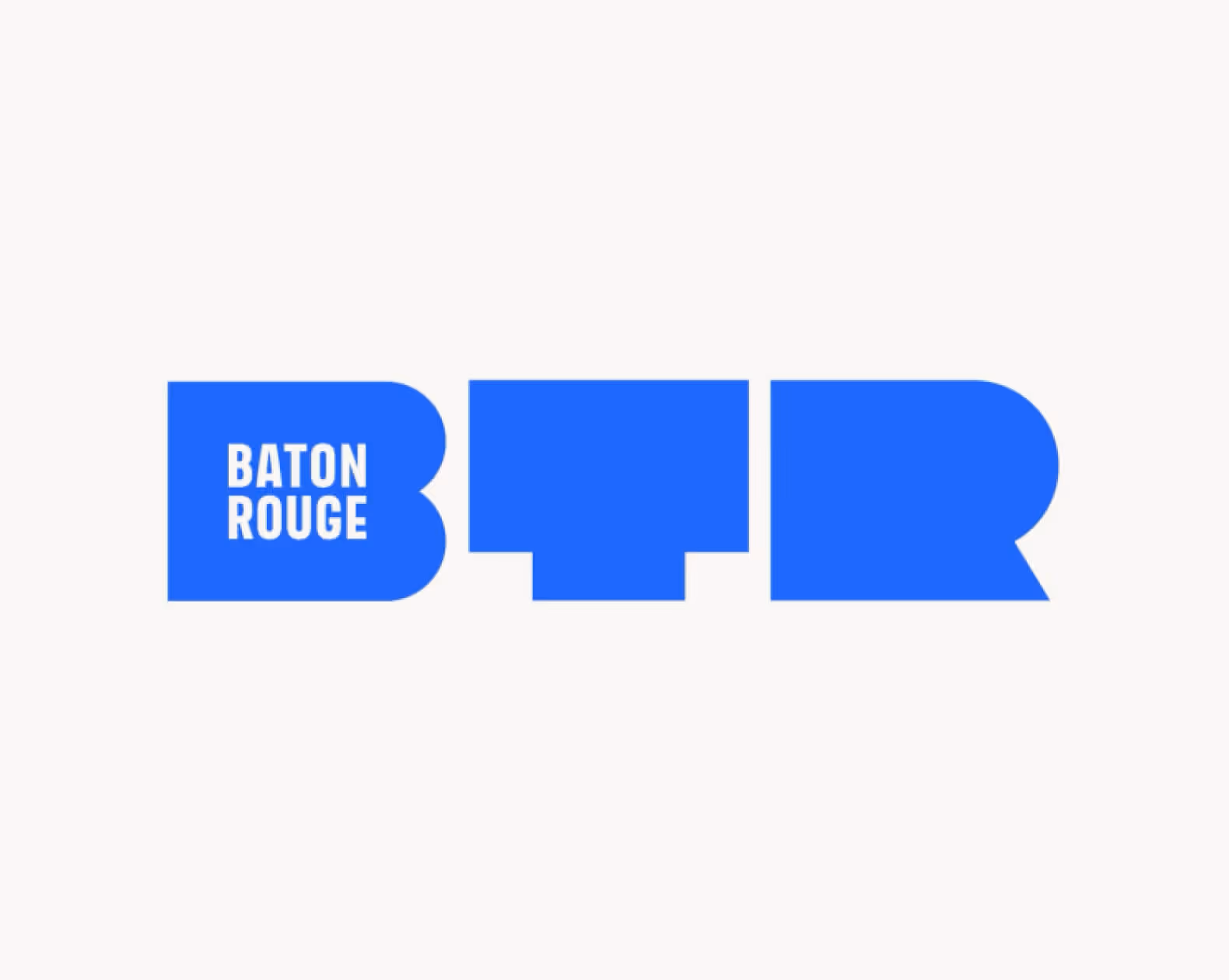 Blue stylized letters BTR with the words 'Baton Rouge' inside the letter B on a white background.