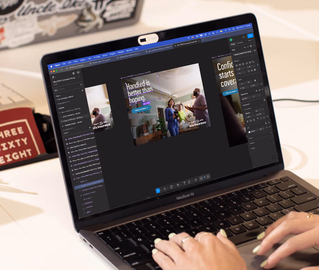 Person using a MacBook Air editing a webpage with text overlays reading 'Handled is better than hoping' in a web design interface.