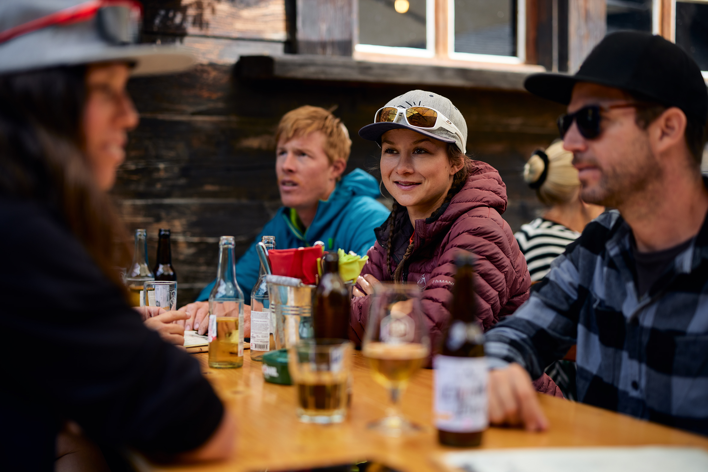 A group enjoying a drink at a terrace in Zermatt.