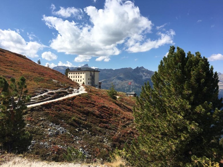 View of the Weisshorn Hotel in the distance at the top of the mountain