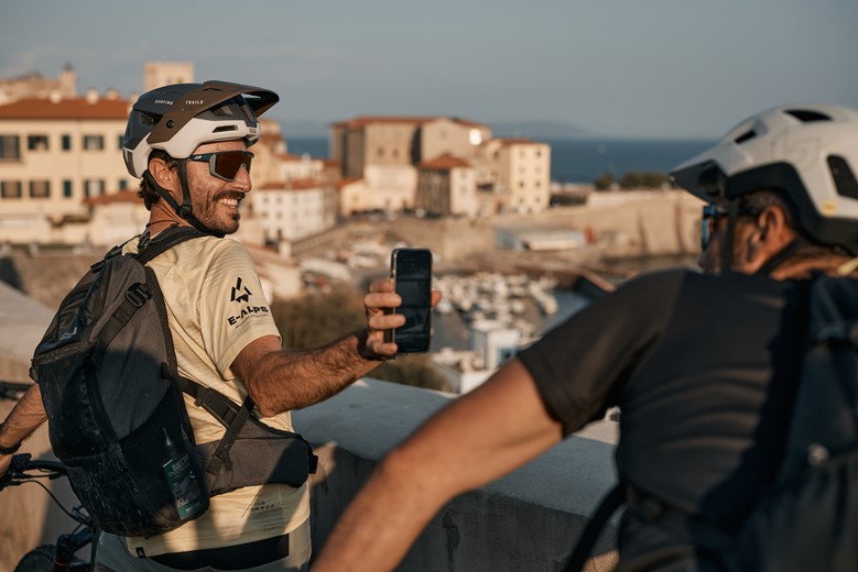 Admiring the historic streets of Piombino after a sunset ride