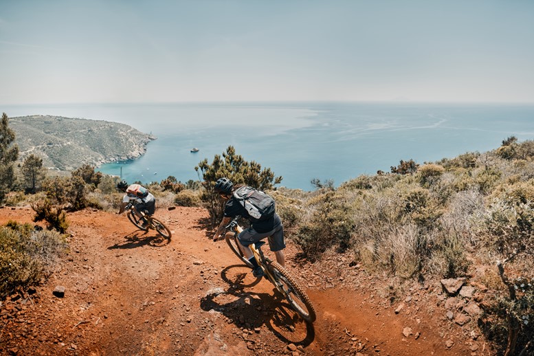 Riding on the red sands of Elba Island's ancient mines with a sea view