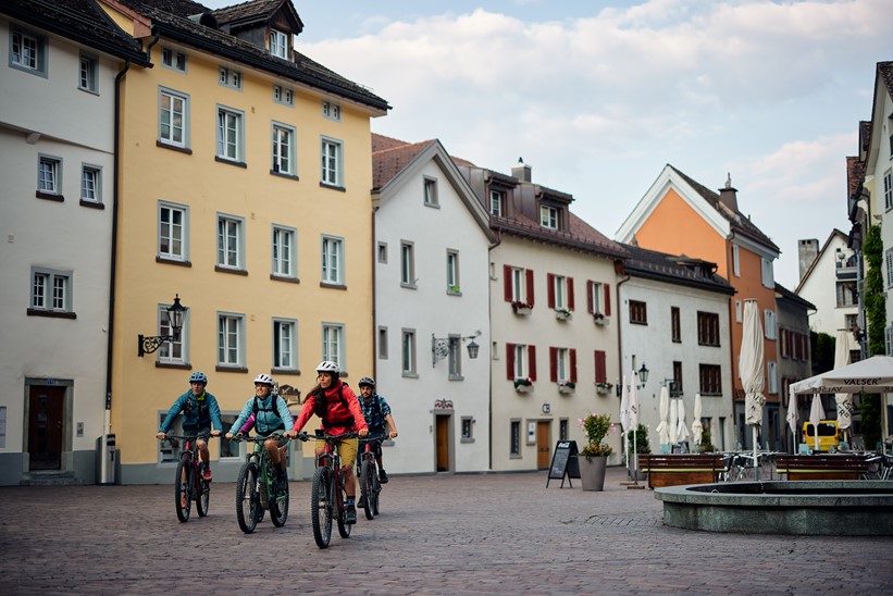 Riding through Chur's historical streets