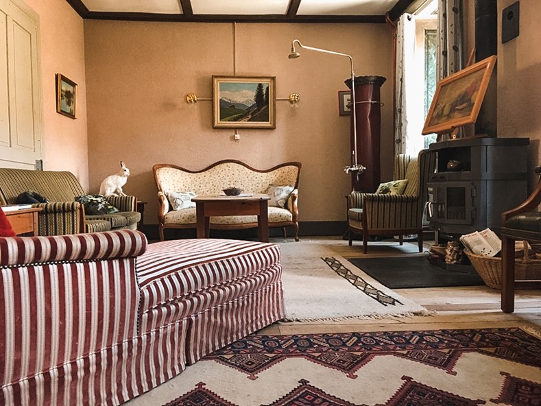 The interior of the Weisshorn Hotel, an Alpine historic hotel, oozes Alpine charm and 19th century nostalgia.