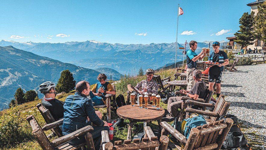 Dylan with a group during the Verbier-Zermatt Haute on a sunny terrace