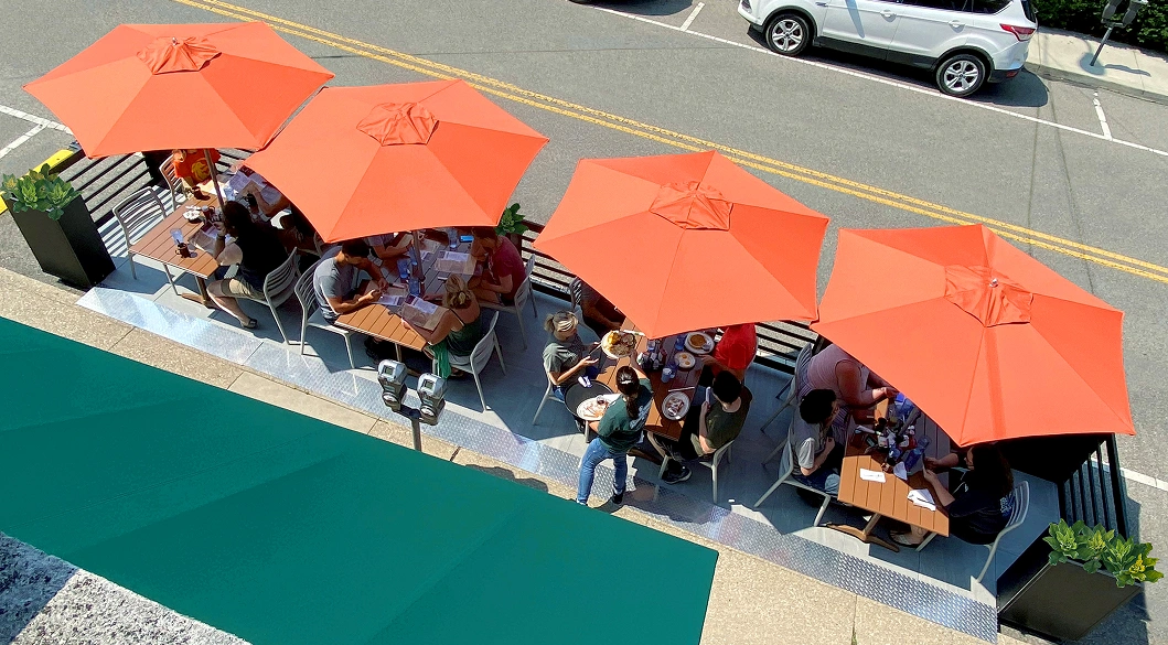 People dining at a parklet in Ohio.
