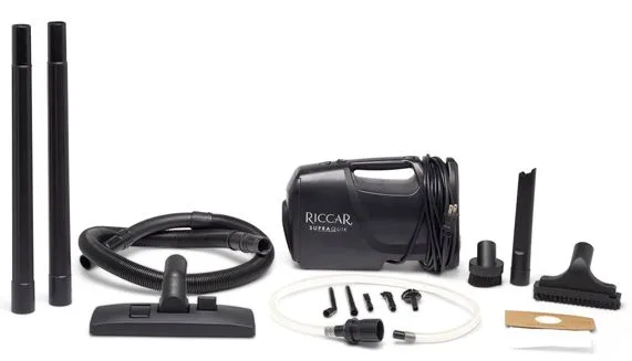 Riccar SupraQuik portable vacuum cleaner with attachments including hose, extension wands, floor nozzle, brush nozzles, and accessories.