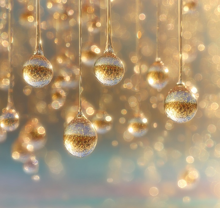 Gouttes dorées suspendues - symbolique des offres de Bareez