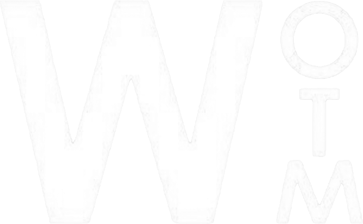 White letters W, O, T, M arranged vertically on a gray background.