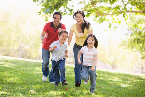 family running chasing kids