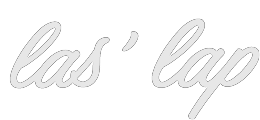 Stylized cursive text reading 'las' lap' in light gray.