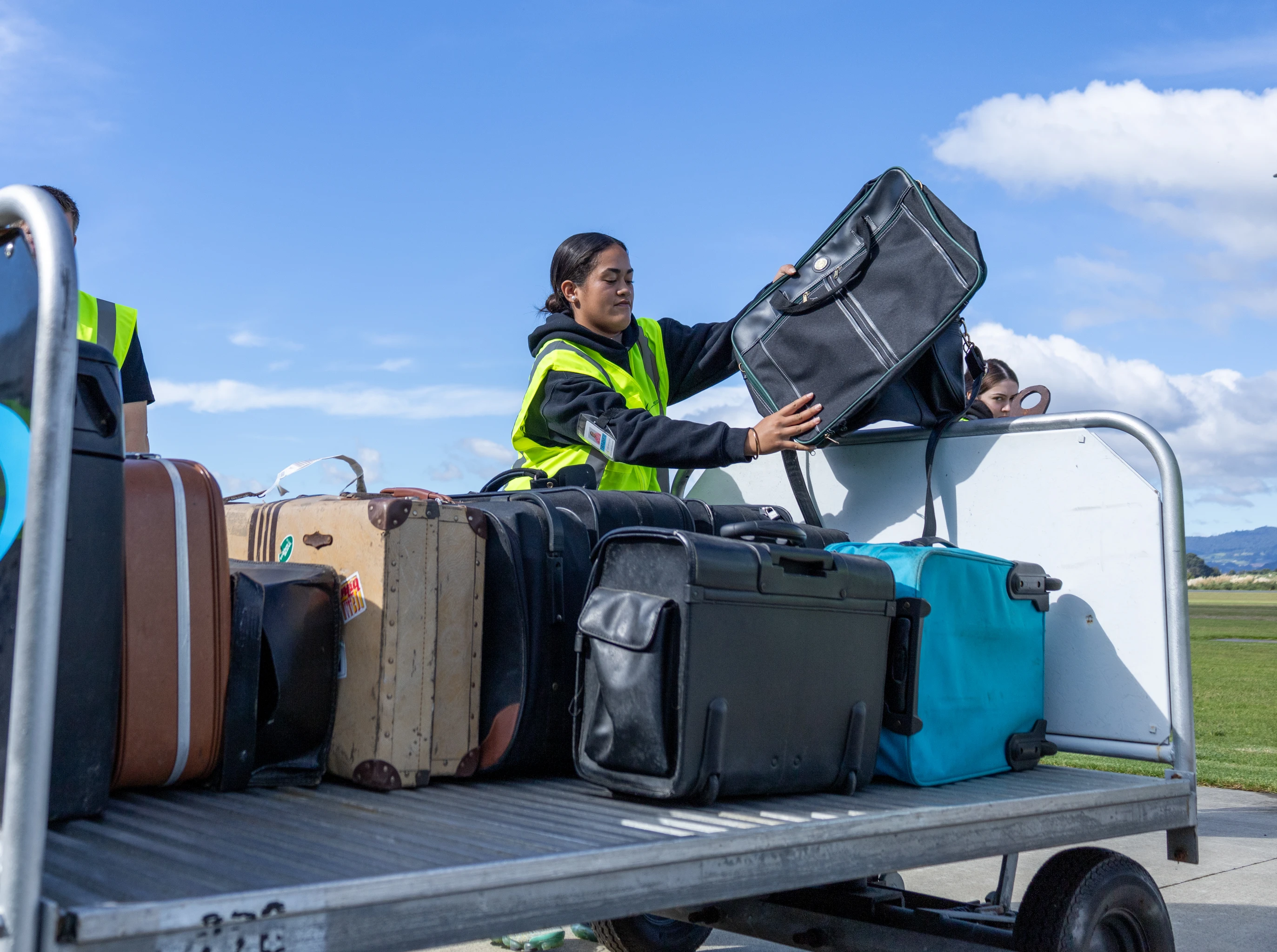 Ground Handling Students sorting baggage
