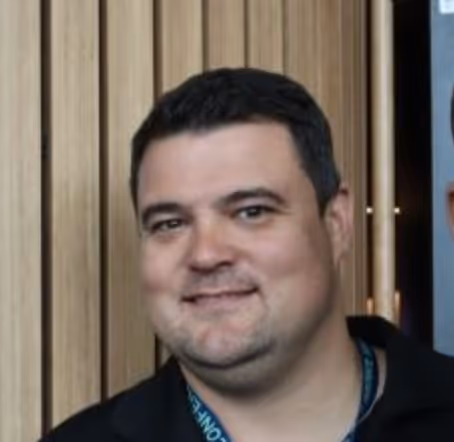 [headshot] image of satisfied customer shaking hands with company representative (for a fintech company)