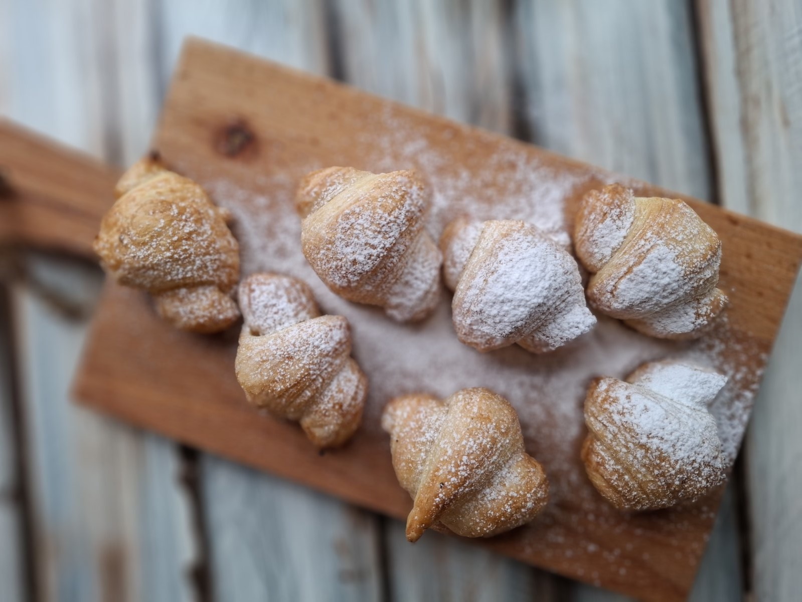 Young diverse couple having lunch with junk food