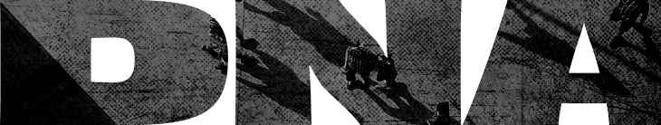 A black and white photo of a street sign.