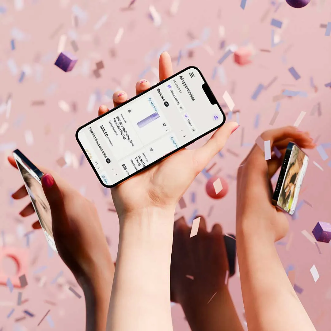 Multiple hands holding smartphones with a shopping app and photos on screens amid falling confetti.