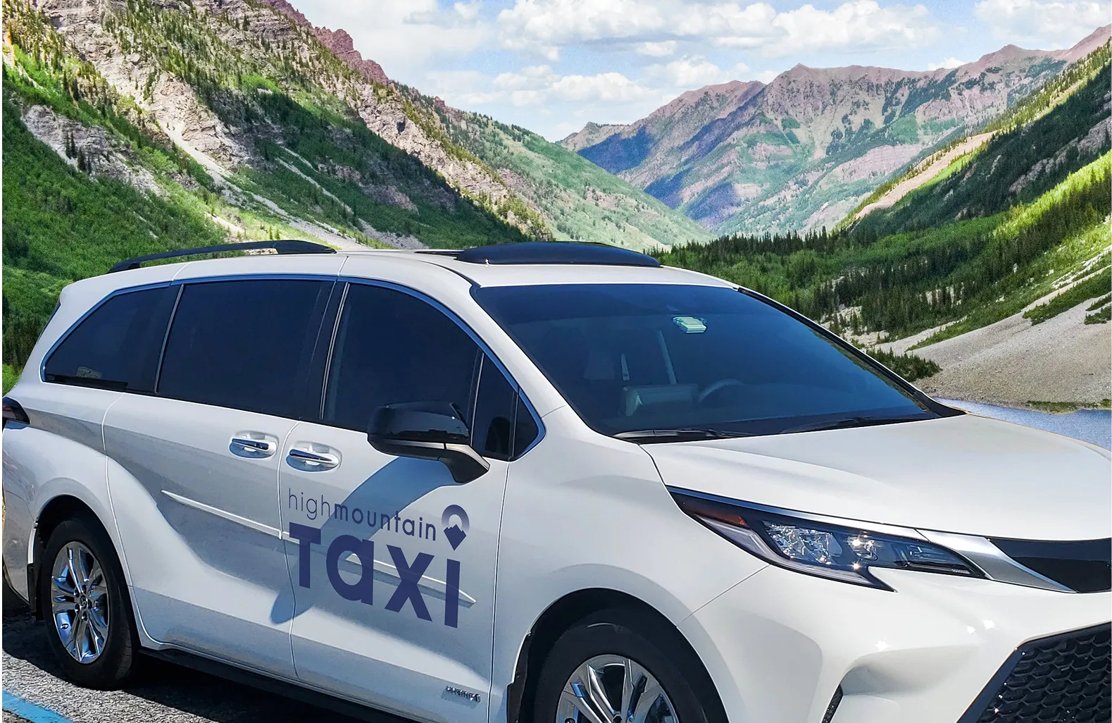 High Mountain Taxi van driving through scenic mountain road near Aspen and Vail, Colorado