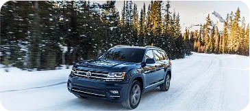 Private winter taxi driving through snowy mountain road near Aspen Colorado