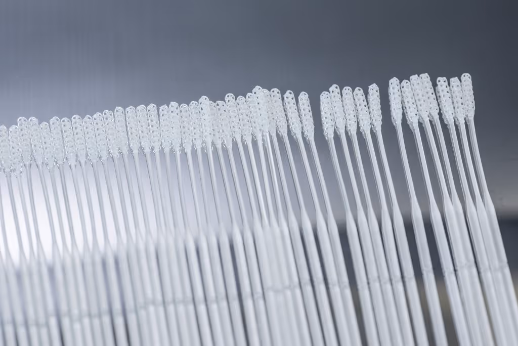 Row of Origin Swabs on Metallic surface