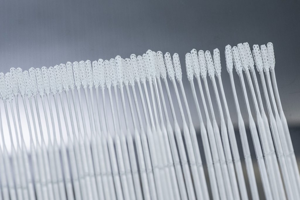 Row of Origin Swabs on Metallic surface