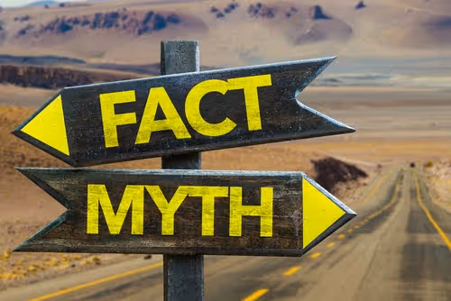 Fact Myth signpost in a desert road 