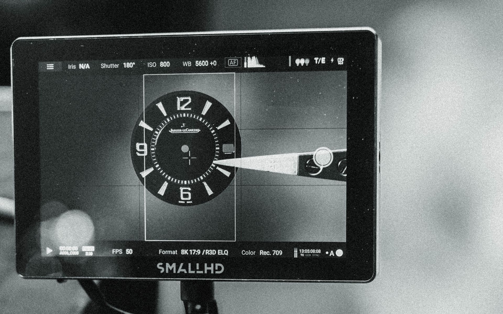 Field monitor displaying a luxury watch close-up during L'Imagerie Films luxury video production.