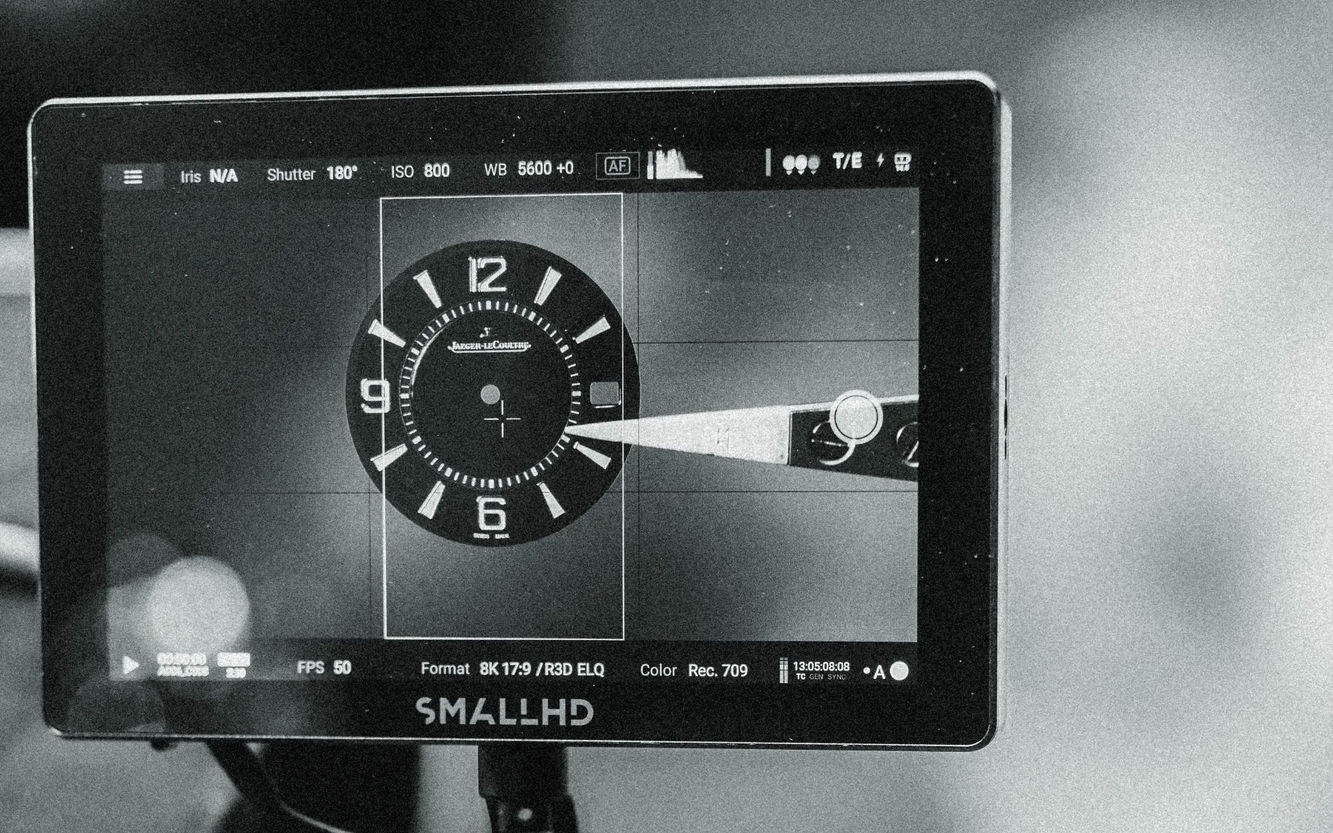 Field monitor displaying a luxury watch close-up during L'Imagerie Films luxury video production.