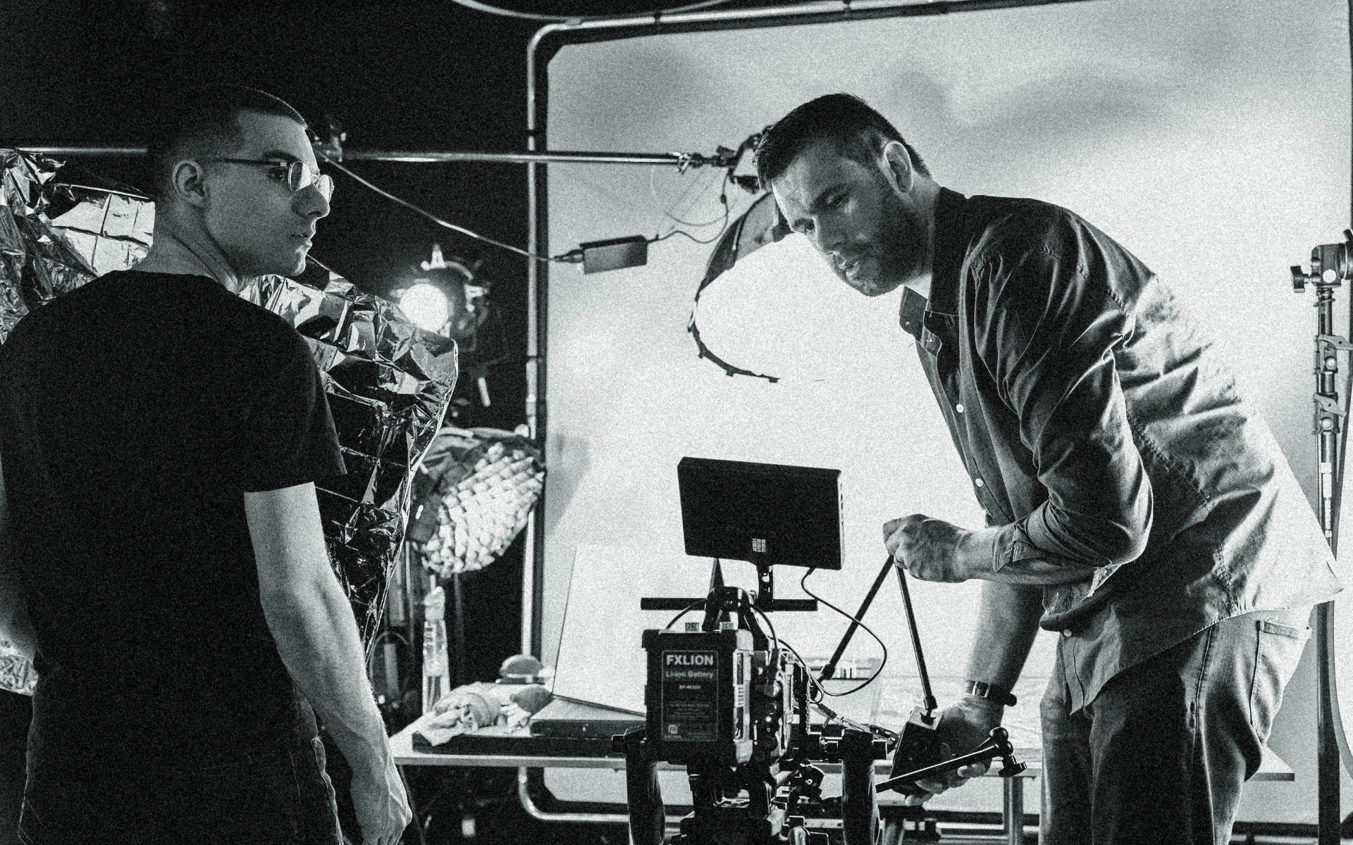 L'Imagerie Films production team filming with a professional camera rig during a luxury video production.