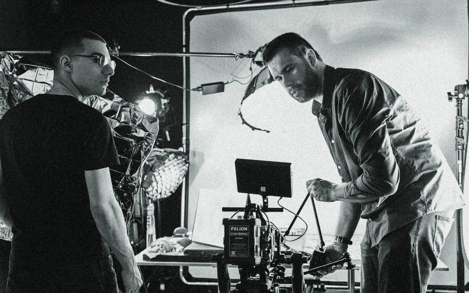 L'Imagerie Films production team filming with a professional camera rig during a luxury video production.