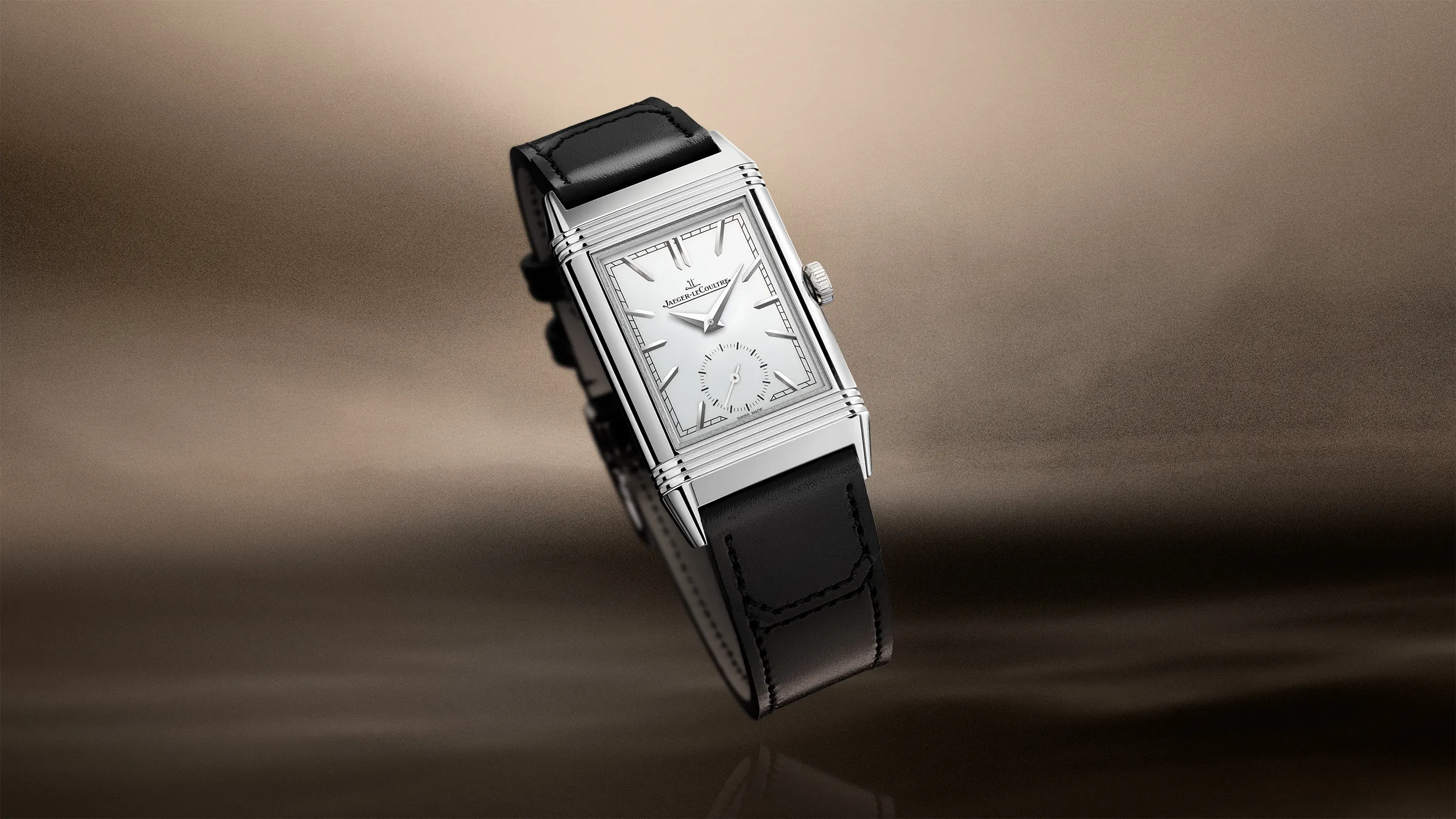 Luxury wristwatch suspended against a blurred background for L'Imagerie Films luxury video production.