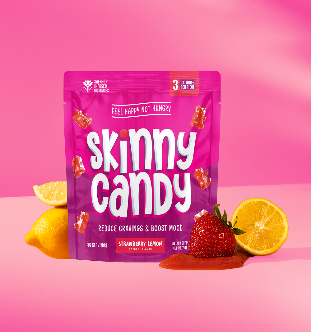 A bag of skinny candy next to lemons and strawberries.