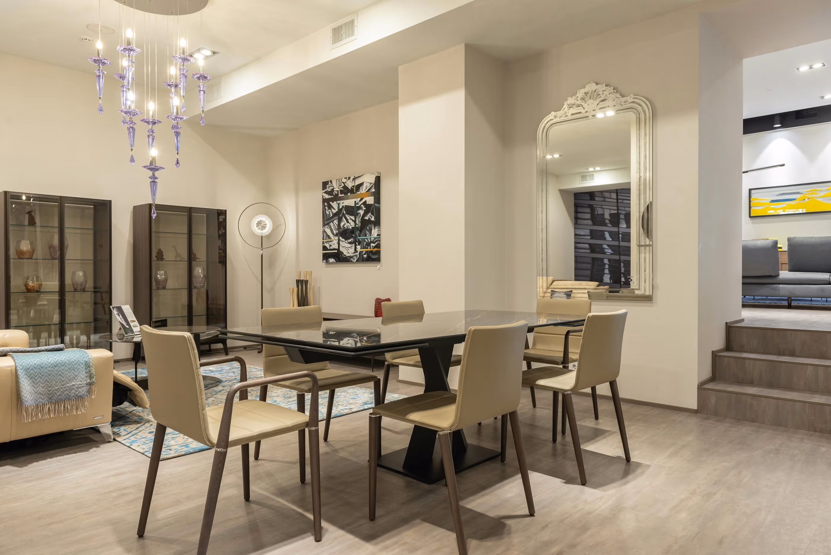 Dining room with glass table and beige chairs