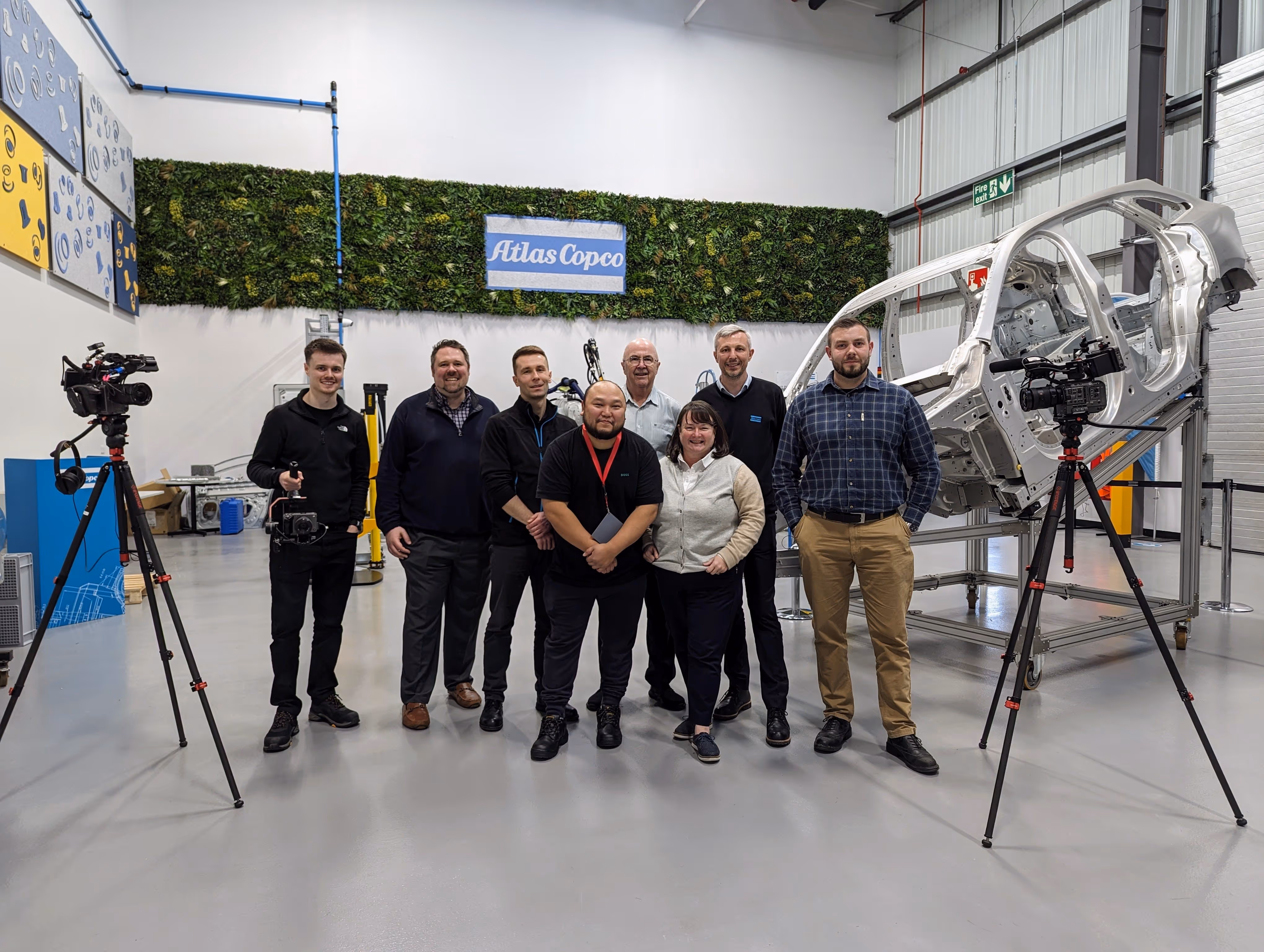 REAS Group video team with Atlas Copco partners during industrial filming project