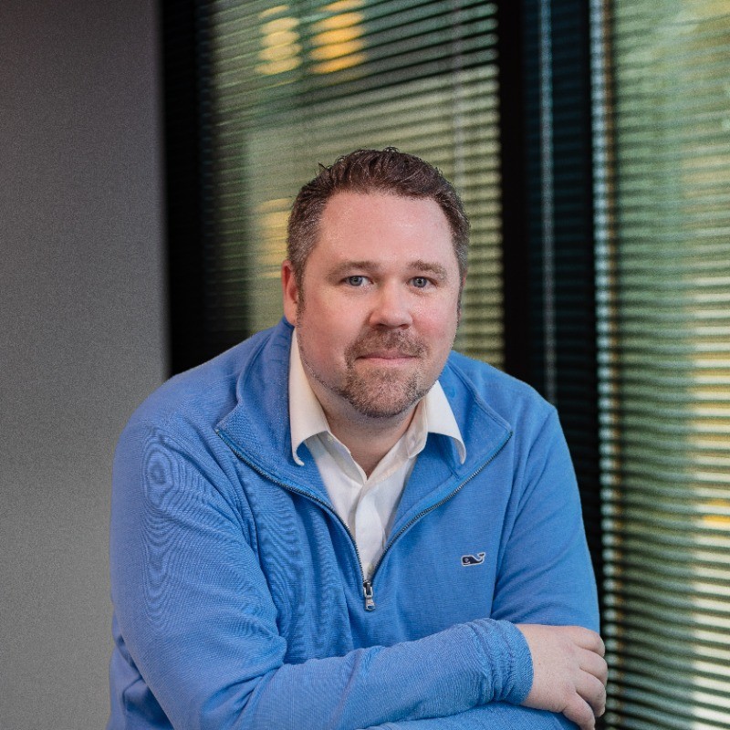 Portrait of Devin Gage, Program Manager at IAOB