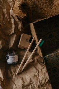 brushes and activated charcoal next to a box 