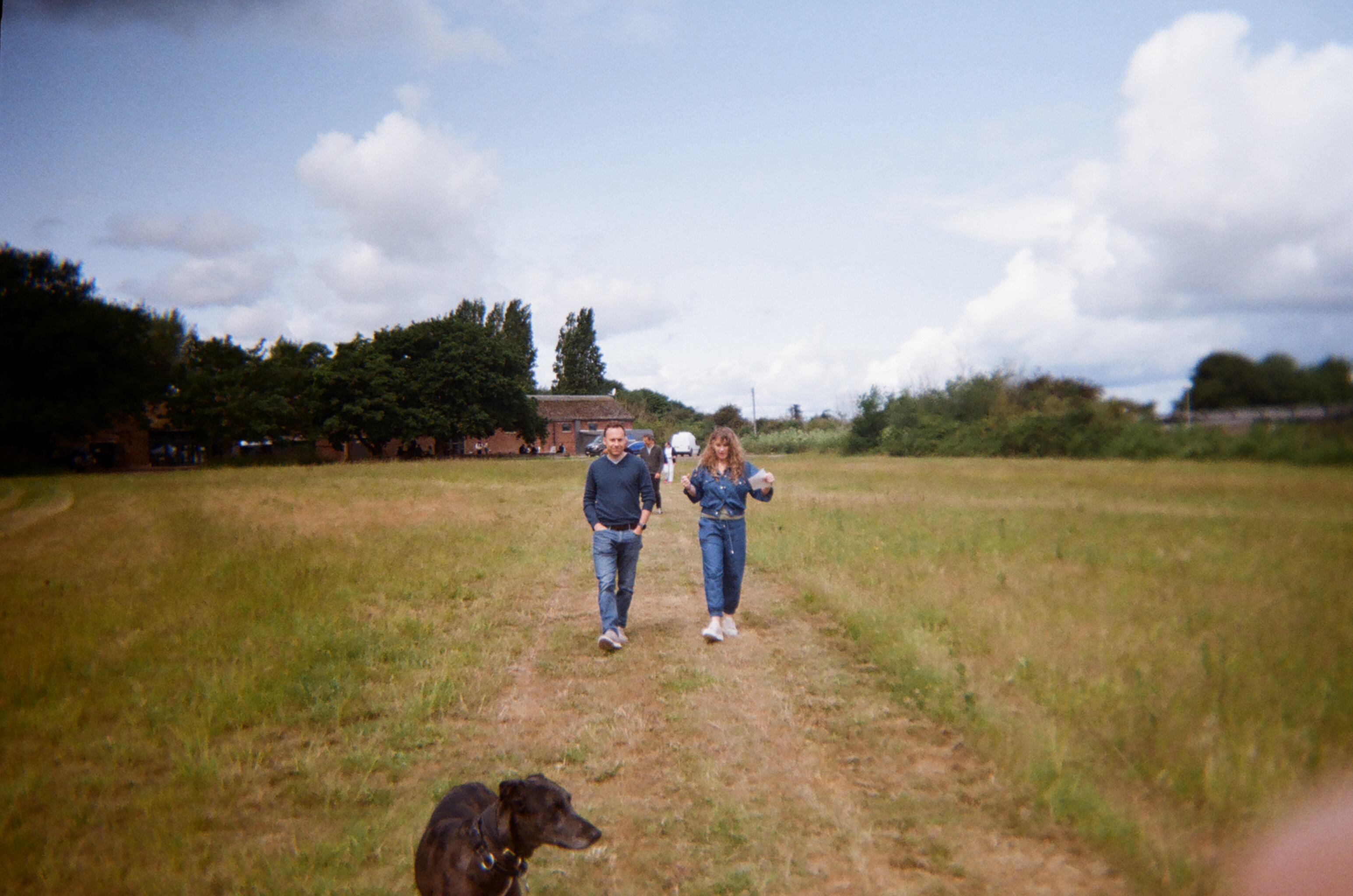 Osea Island Optimistical event, two people walking 