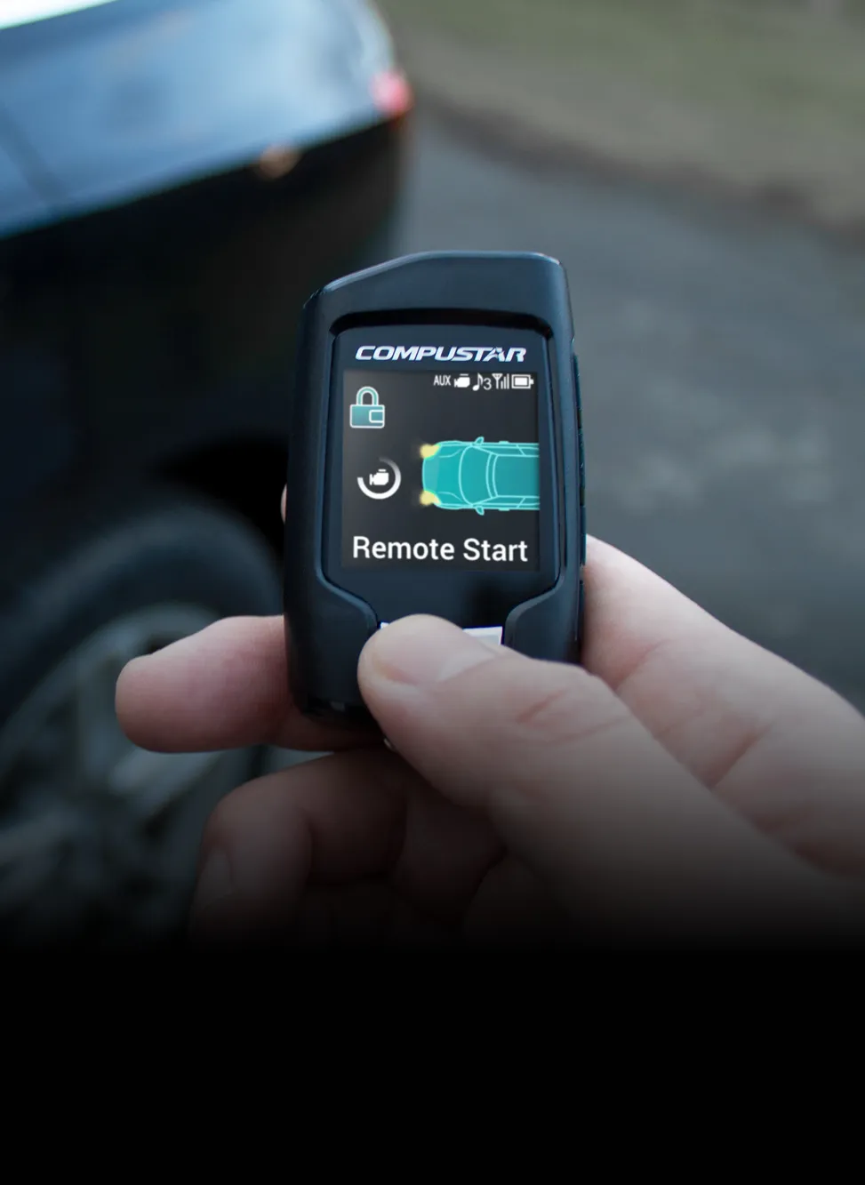 Close-up of a compact black dash camera mounted inside a vehicle with the label 'M1 MOMENTO' next to the lens.